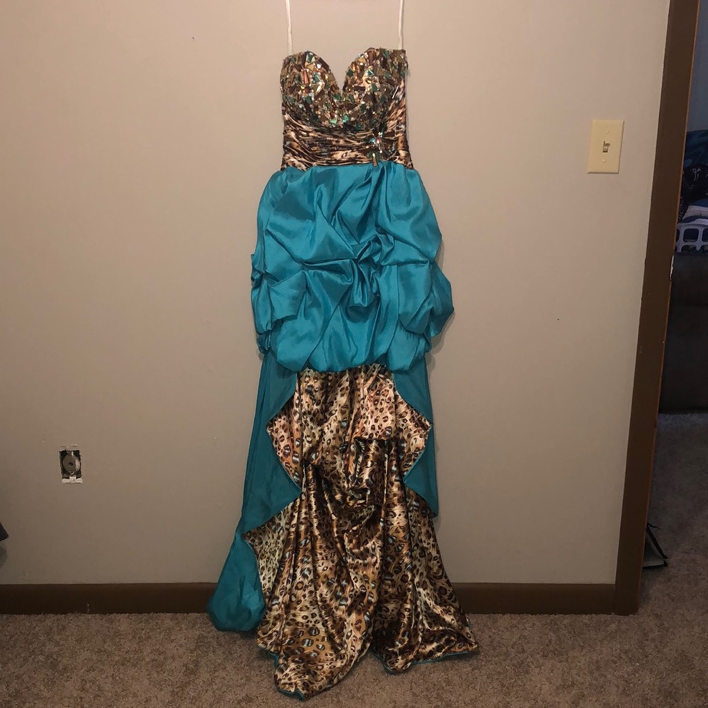 Blue gemmed up cheetah printed prom dress.